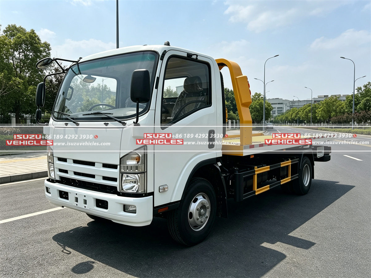 ISUZU 3 Ton Flatbed Wrecker Truck (2) ISUZU 3 Ton Flatbed Wrecker Truck (2)